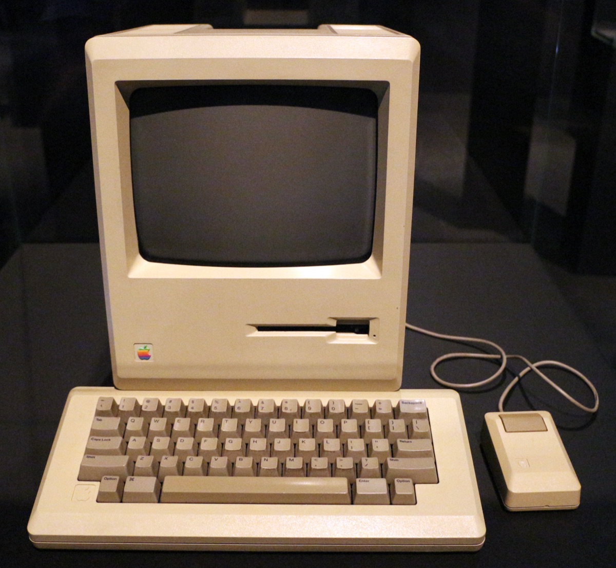The original Apple Macintosh 128K computer, 1984, with its small CRT screen and beige case